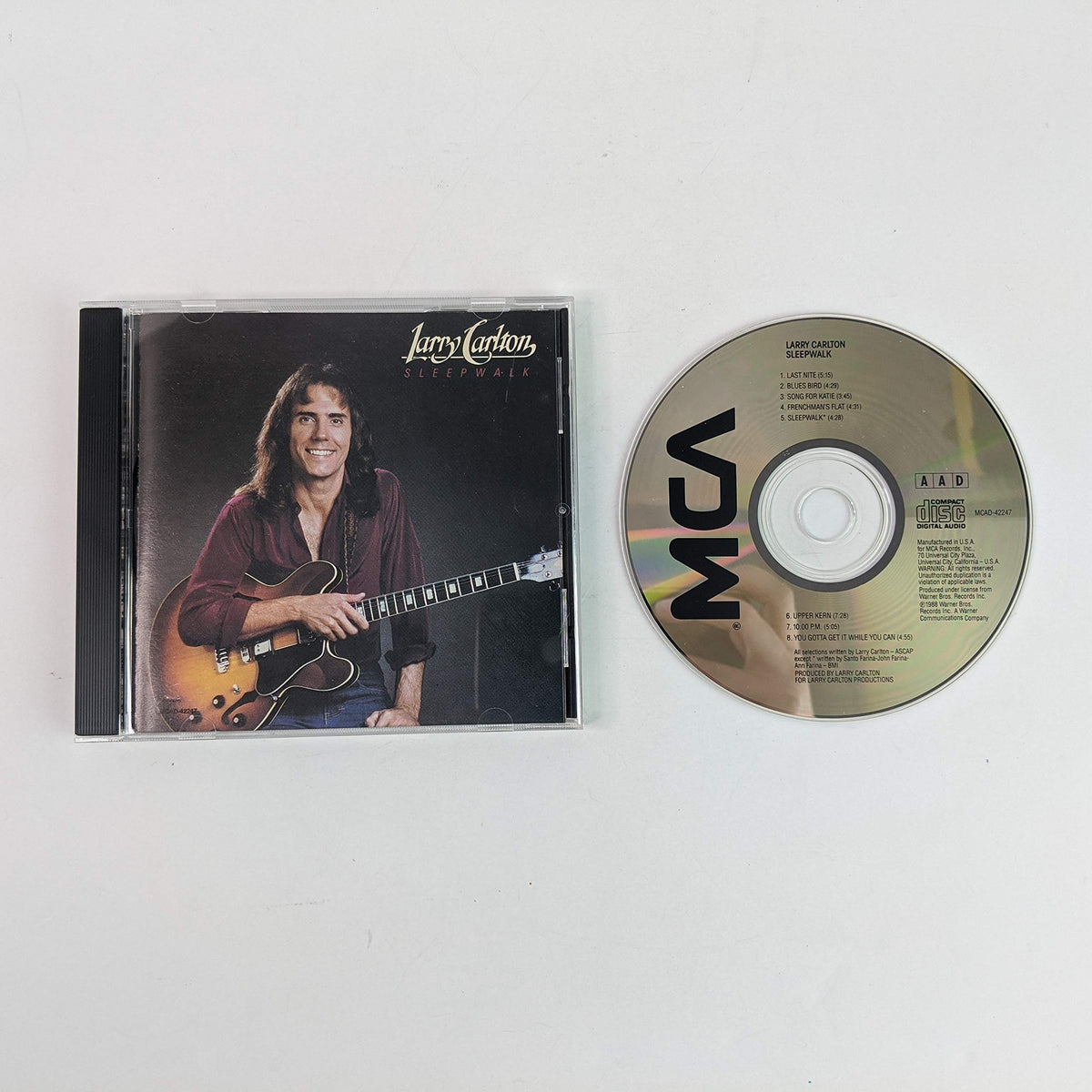 Larry Carlton – Sleepwalk (Japan Edition 2014 CD, Limited Edition, Remastered, Reissue, WPCR-28051, Warner Bros. Records)